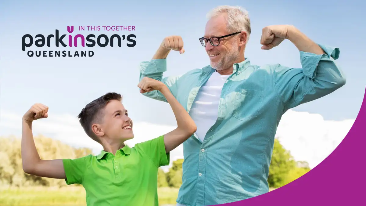a man and boy flexing their arms
